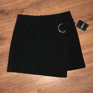 Black striped skirt.
